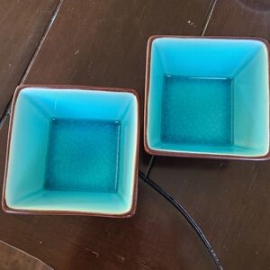2 stoneware square serving bowls. Black, brown trim & blue crackled interior